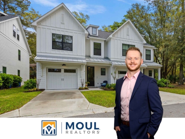 6 Pink Sand Ln- Agent in front of property