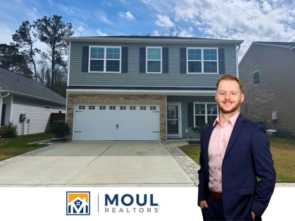 142 Great Bend - Agent in front of property