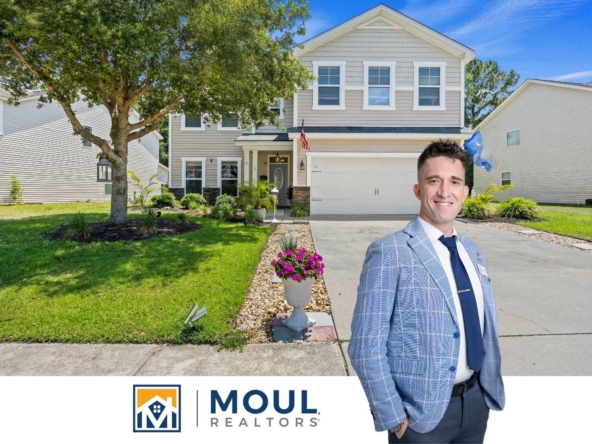 63 Sago Palm Dr - Agent in front of Property