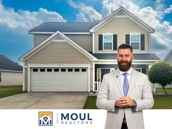 545 Hearthstone Dr - Agent in front of property