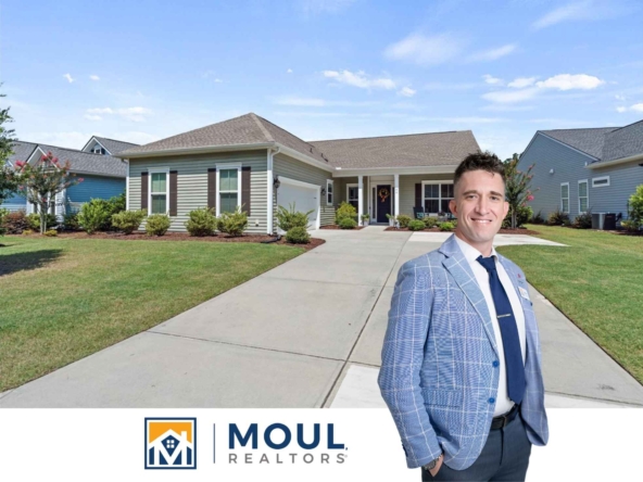 56 Carolina Oaks Ave - Agent in front of property