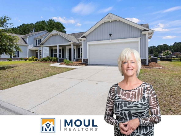24 Sand Live Oak - agent in front of property