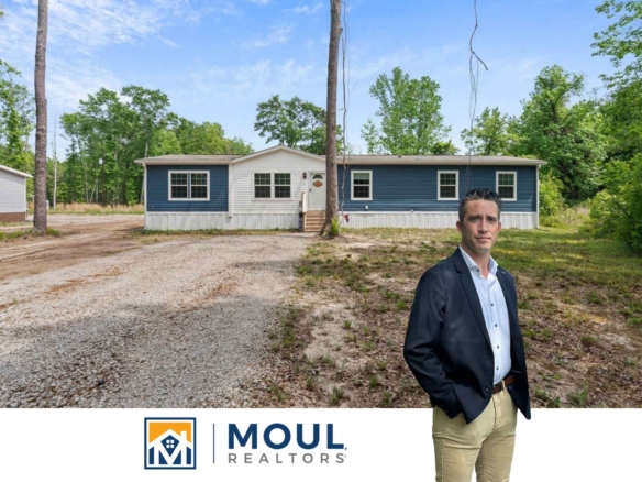 48 Community Center - Agent in front of property